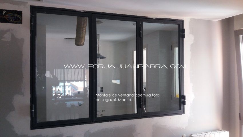 Muro cristal abatible